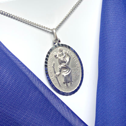 Large sterling silver oval men’s St. Christopher with curb chain