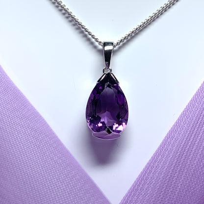 Large pear shaped purple amethyst white gold necklace