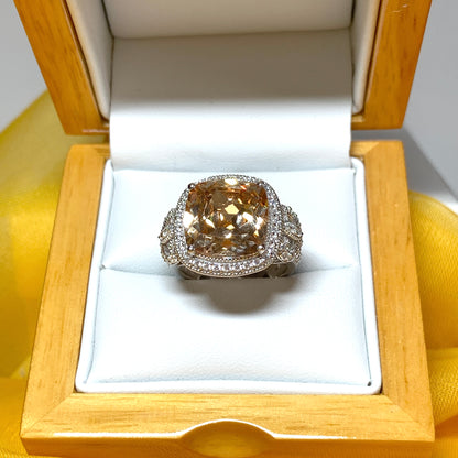 Large topaz coloured cocktail ring with decorated shoulders