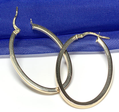 Yellow gold large oval hoop earrings plain polished