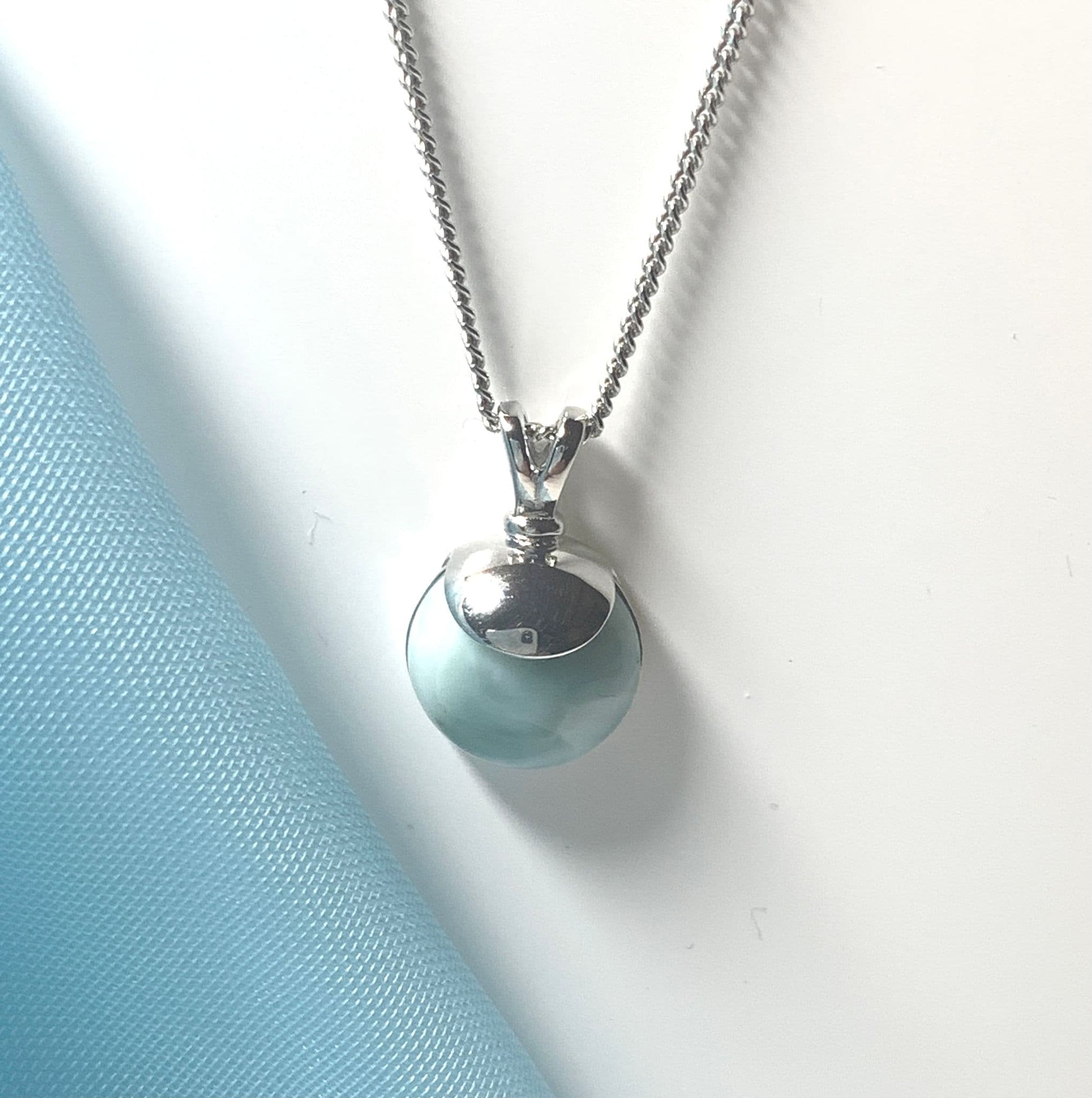 Round light blue larimar necklace sterling silver pendant