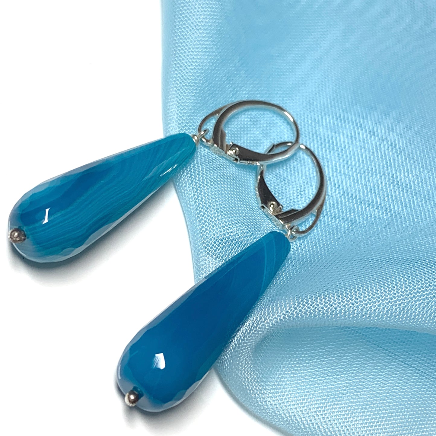 Light blue teardrop shaped agate long drop earrings