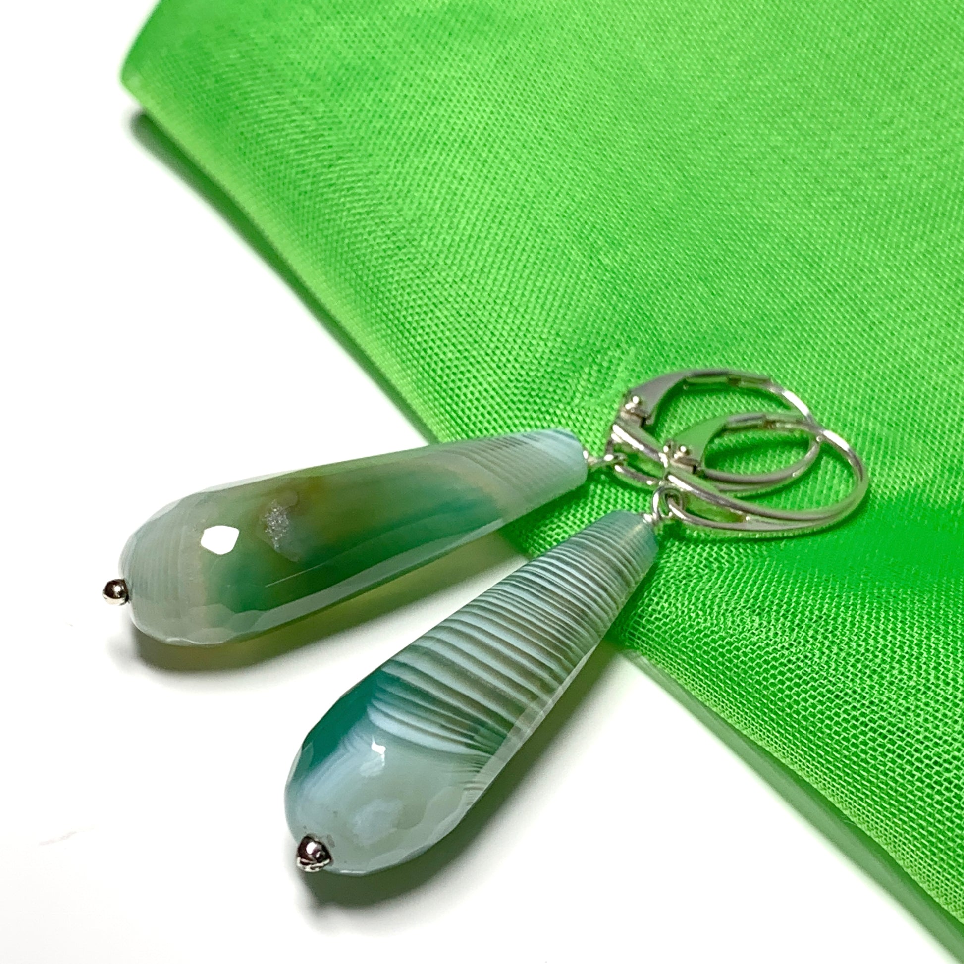 Light green patterned teardrop shaped long drop agate earrings