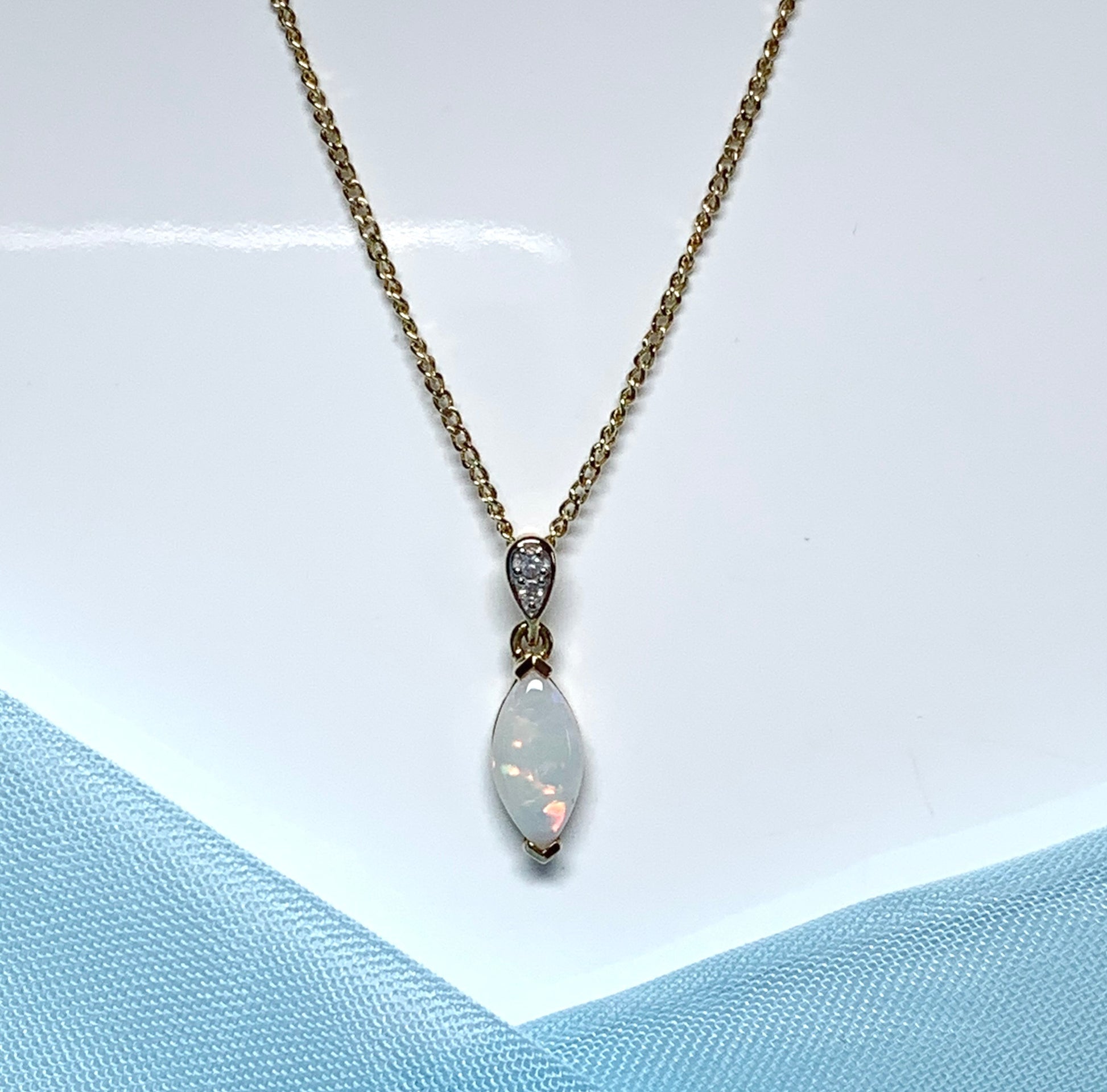 Marquise opal and diamond yellow gold necklace