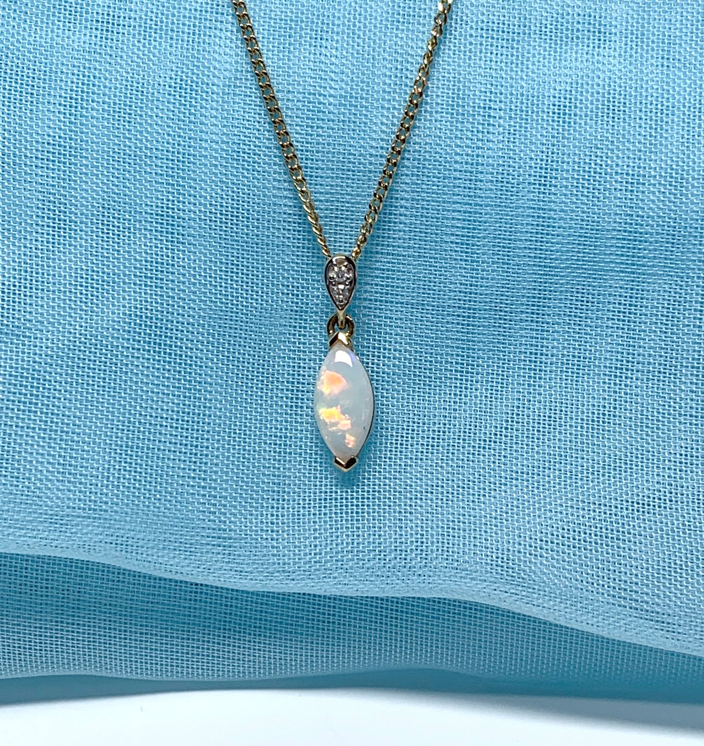 Marquise opal and diamond yellow gold necklace