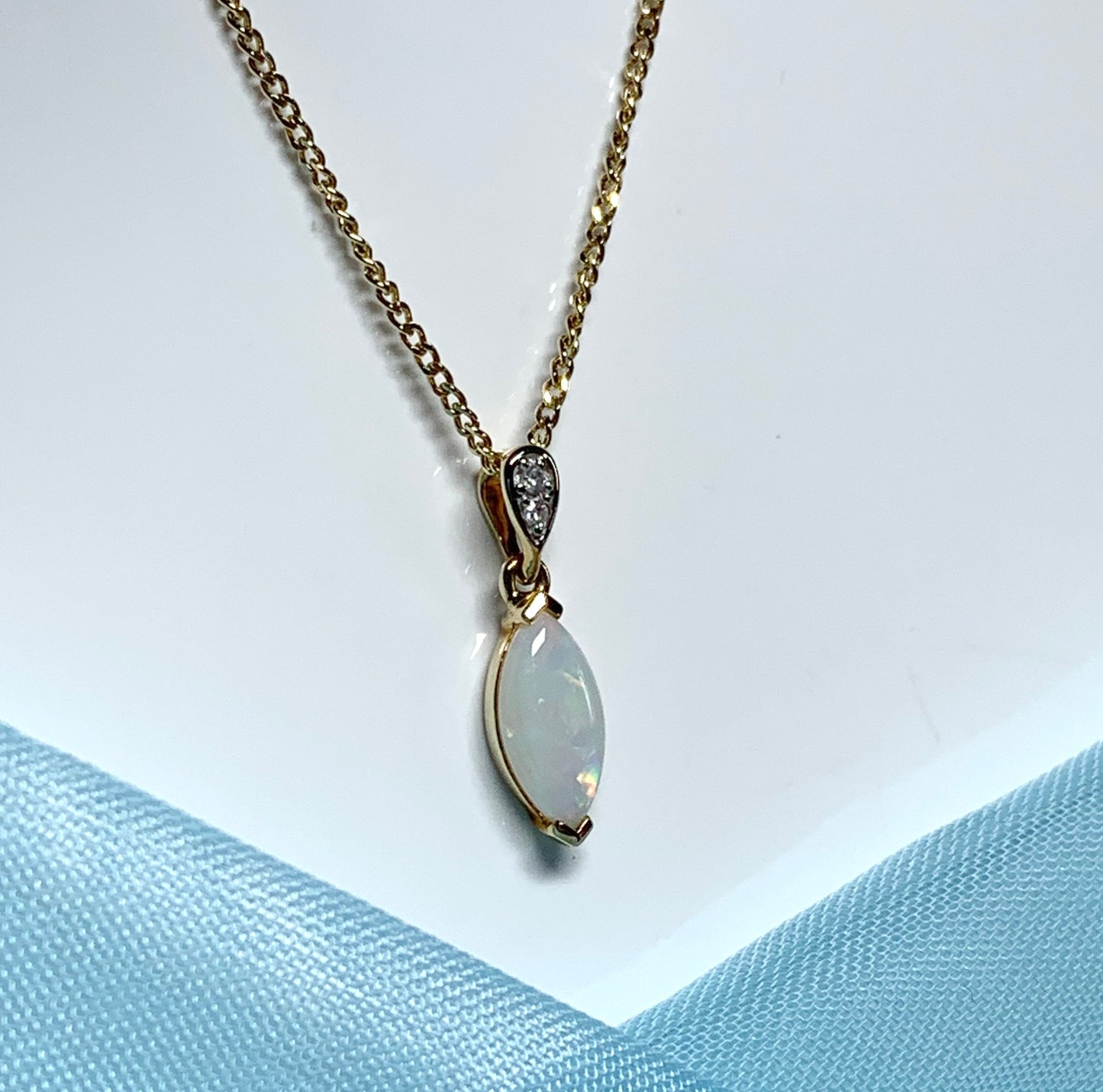 Marquise opal and diamond yellow gold necklace