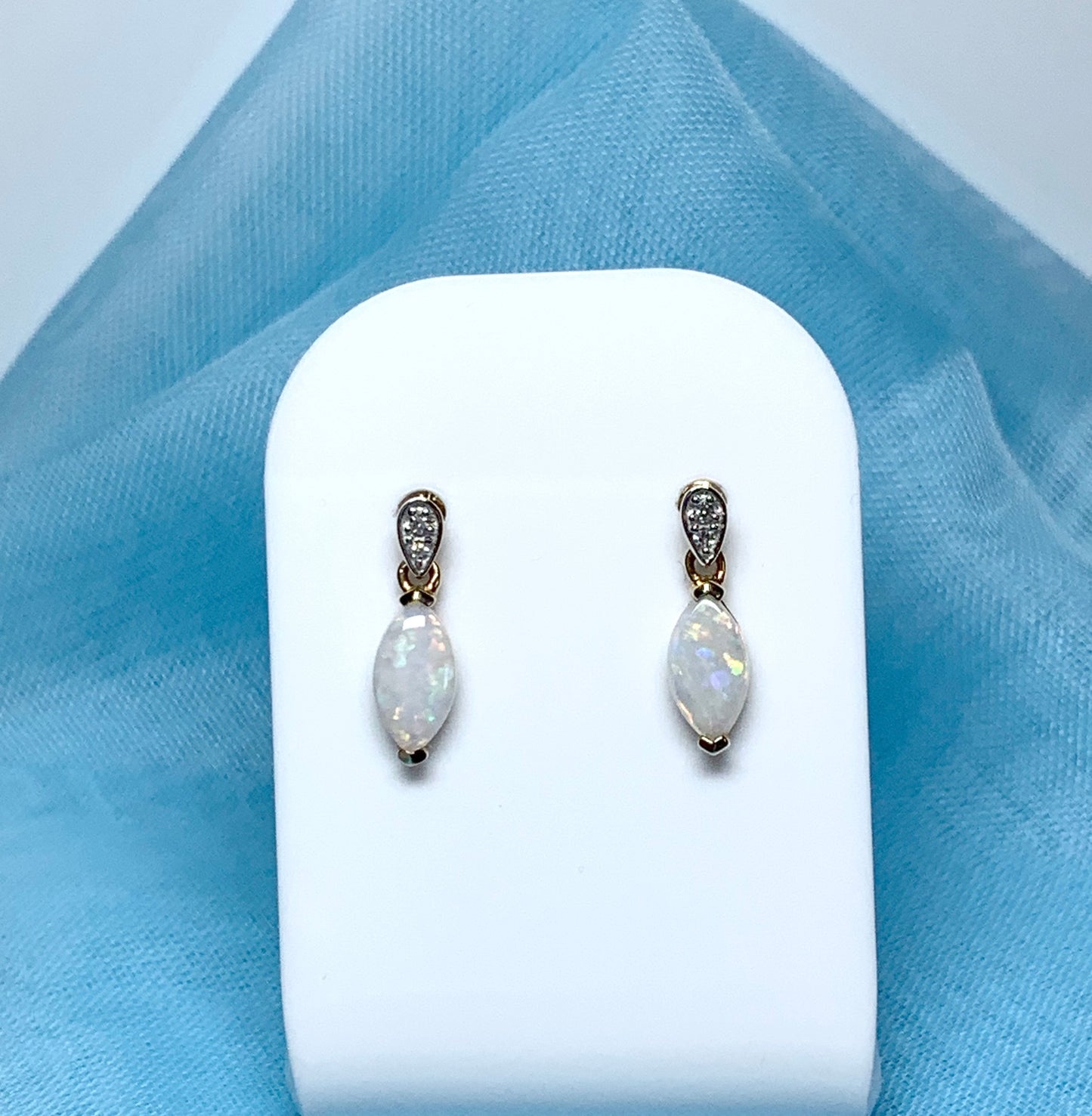 Marquise shaped opal and diamond yellow gold drop earrings