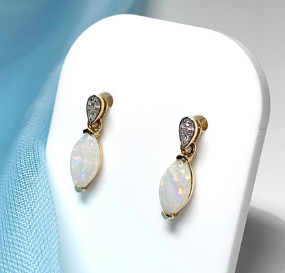 Marquise shaped opal and diamond yellow gold drop earrings