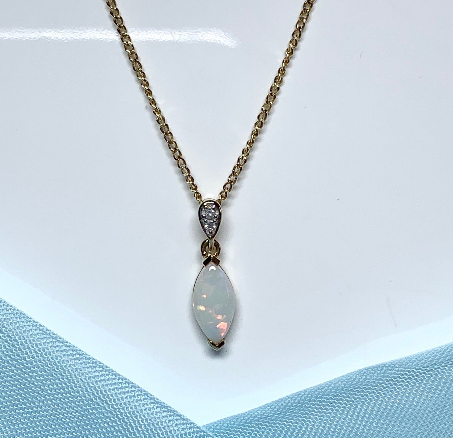 Marquise opal and diamond yellow gold necklace