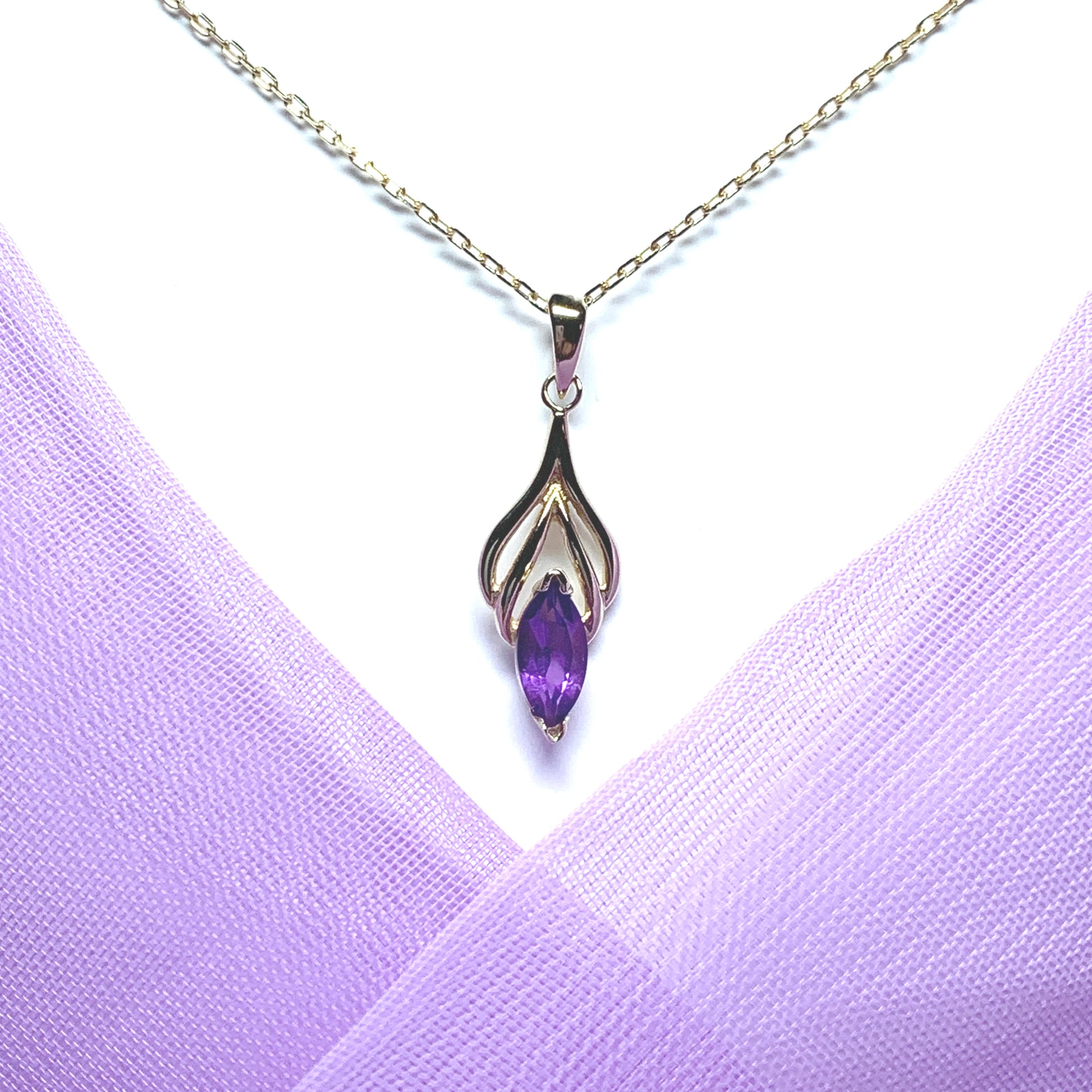 Marquise shaped purple amethyst yellow gold necklace