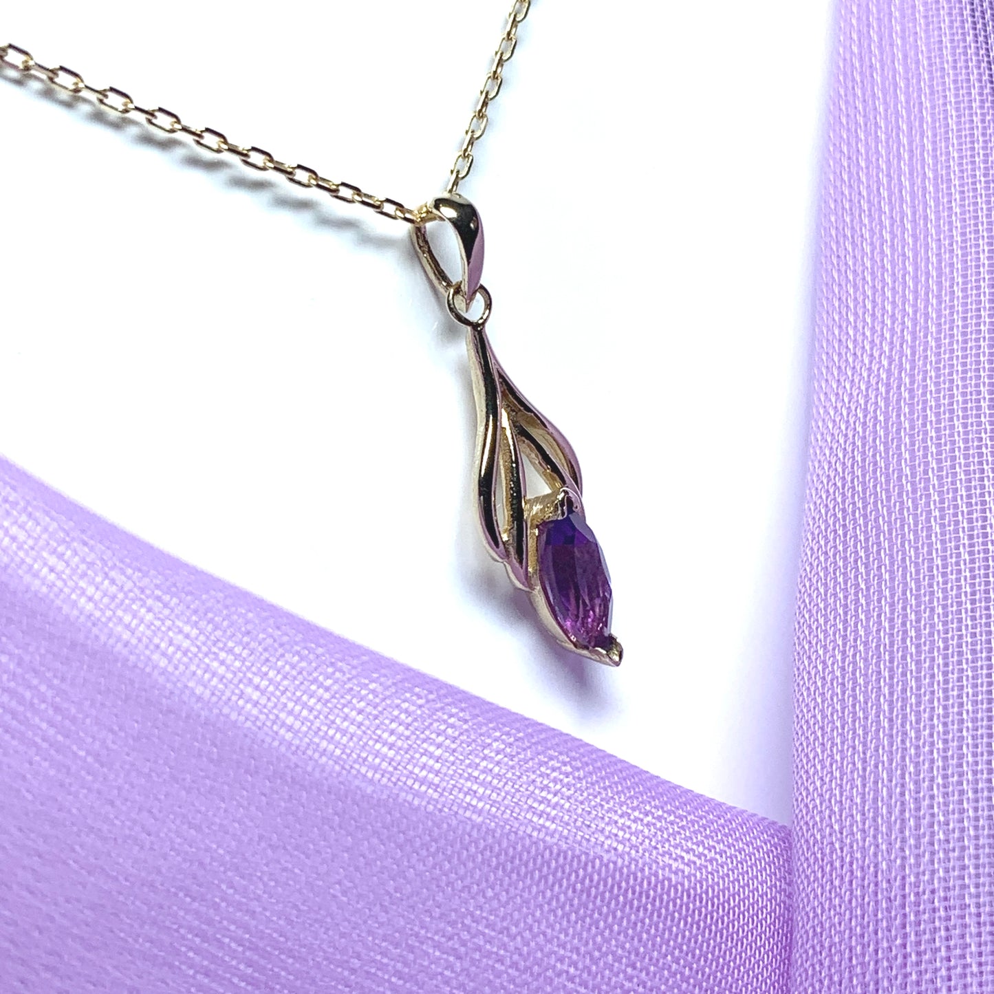 Marquise shaped purple amethyst yellow gold necklace
