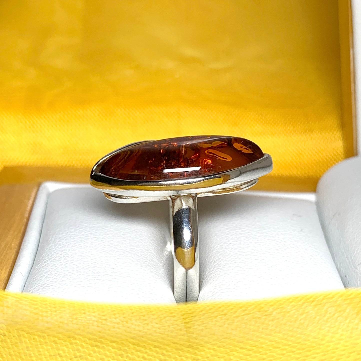 Marquise shaped sterling silver real amber ring