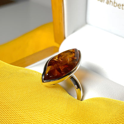 Marquise shaped sterling silver real amber ring