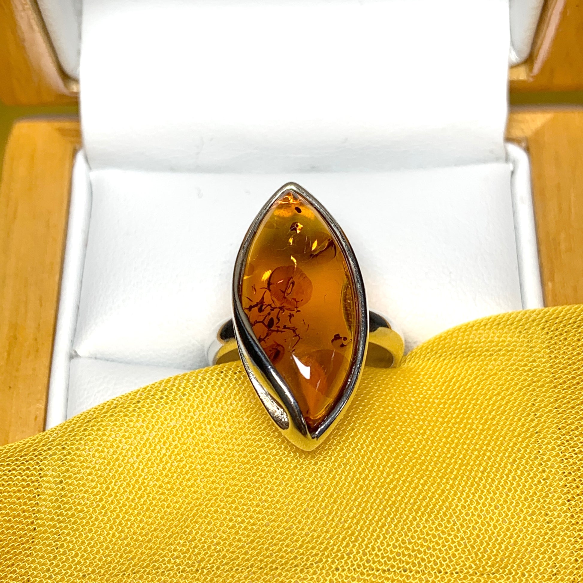 Marquise shaped sterling silver real amber ring