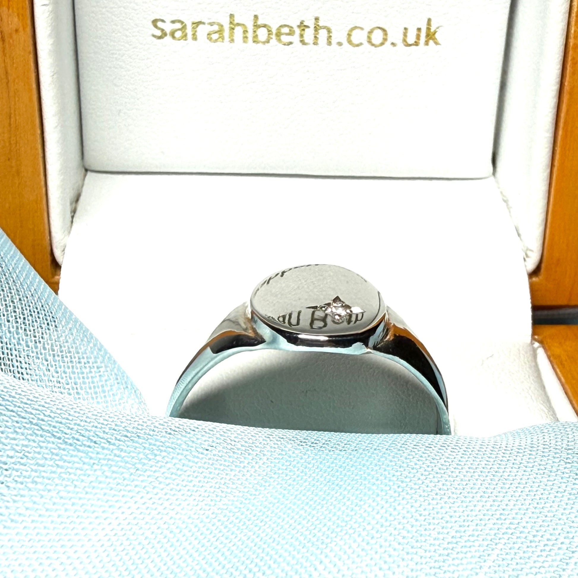 Men's sterling silver oval gents stone set signet ring side view