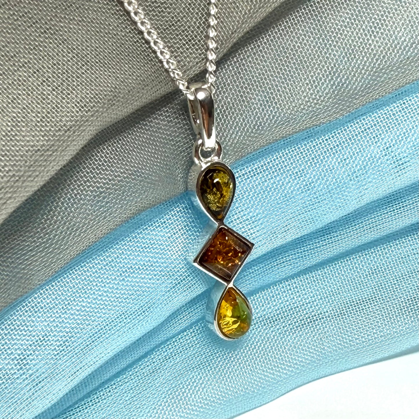 Multi coloured amber sterling silver necklace