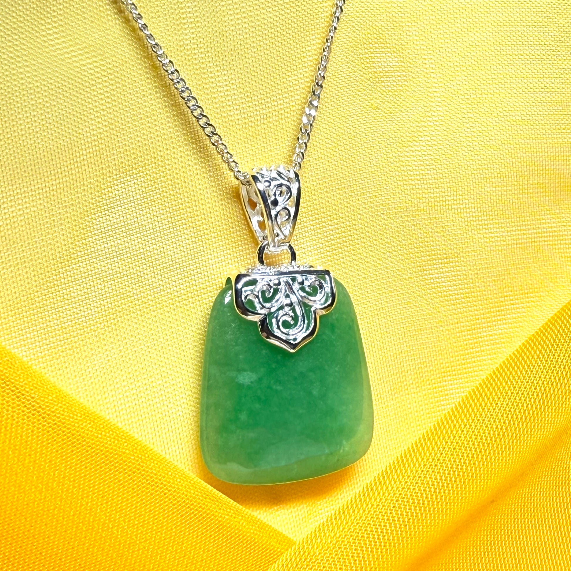 Necklace with a real green jade stone, large pendant cushion shaped with chain