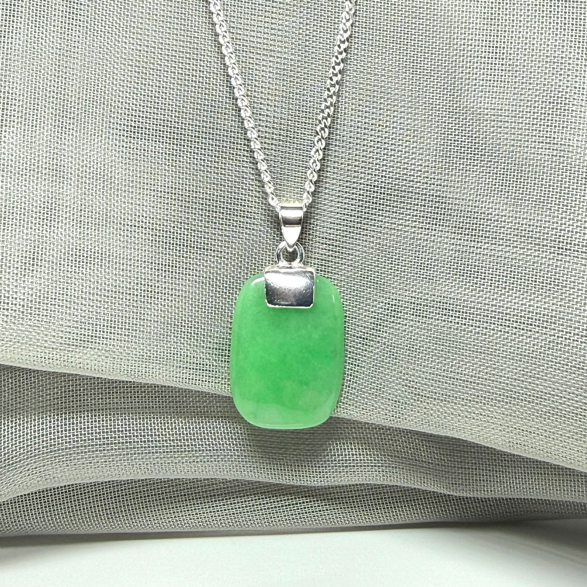 Necklace pendant having real green jade sterling silver cushion shape, stunning
