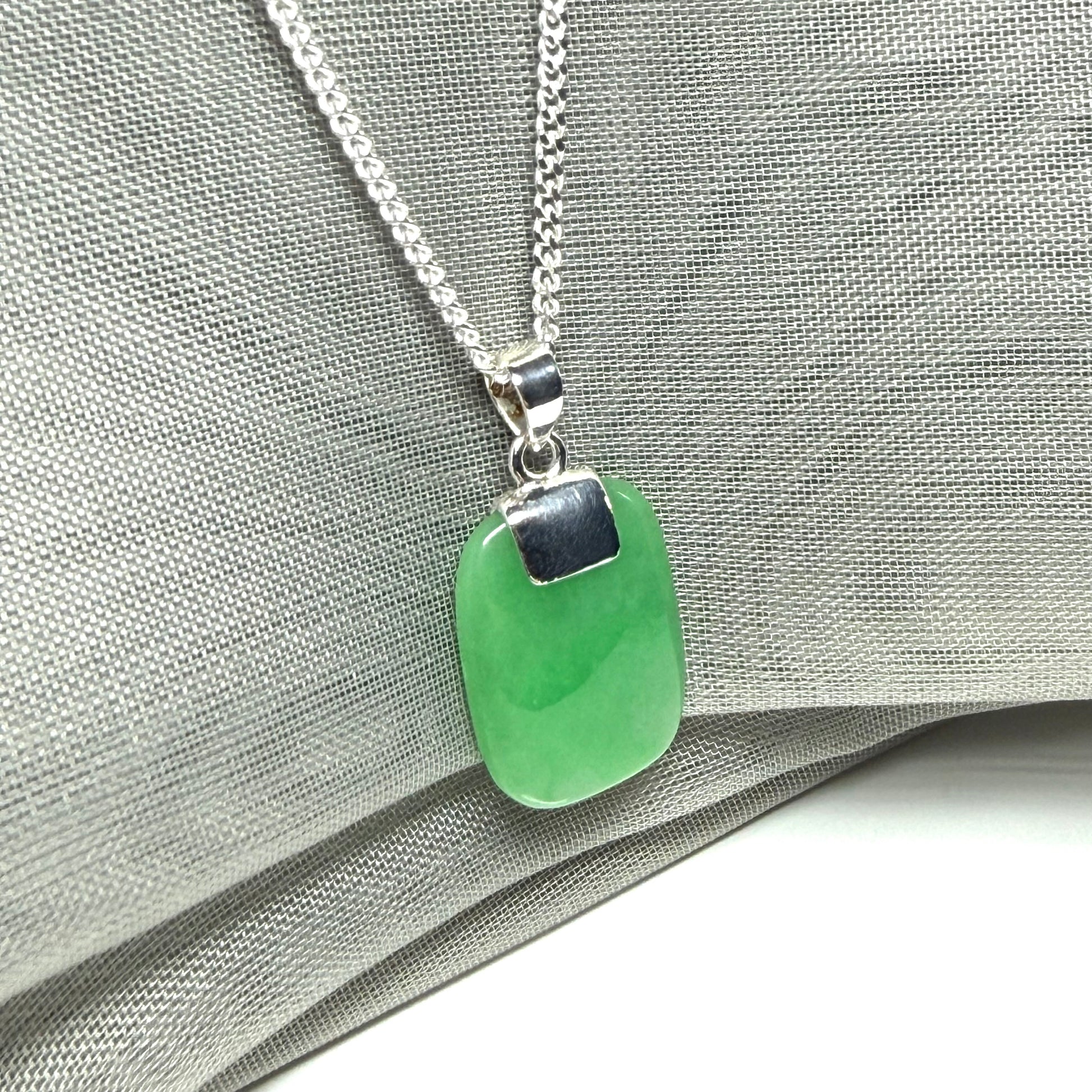 Necklace pendant having real green jade sterling silver cushion shape, stunning