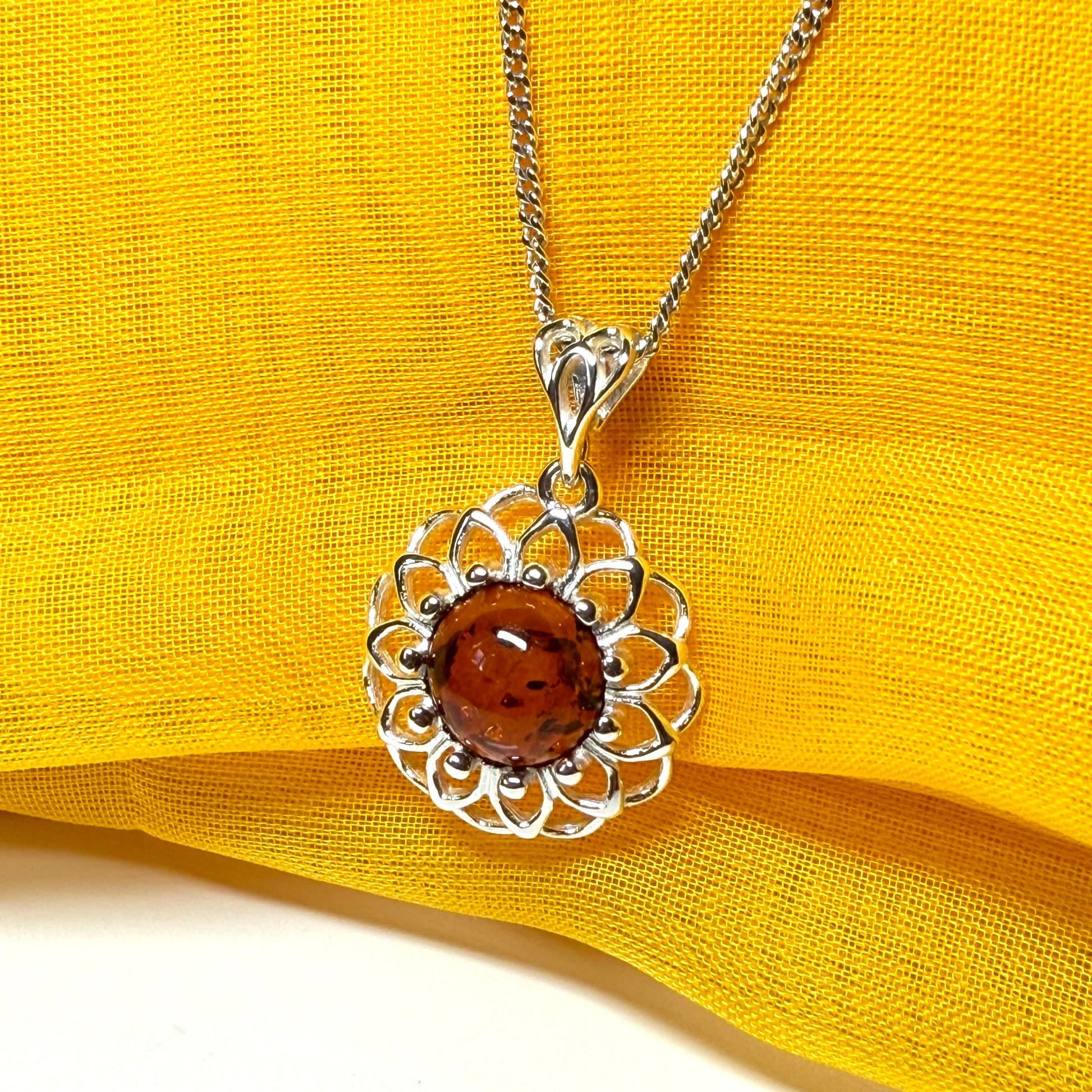 Necklace real amber open pierced round floral designed sterling silver