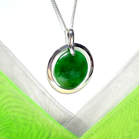 Necklace real dark green jade large round shape with a beautiful designed halo pendant, whispers of dark green