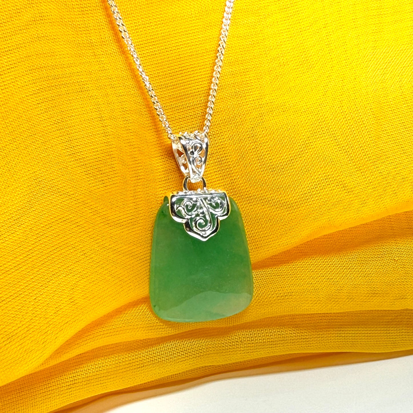 Necklace with a real green jade stone, large necklace cushion shaped, a timeless designed pendant with solid chain included as well