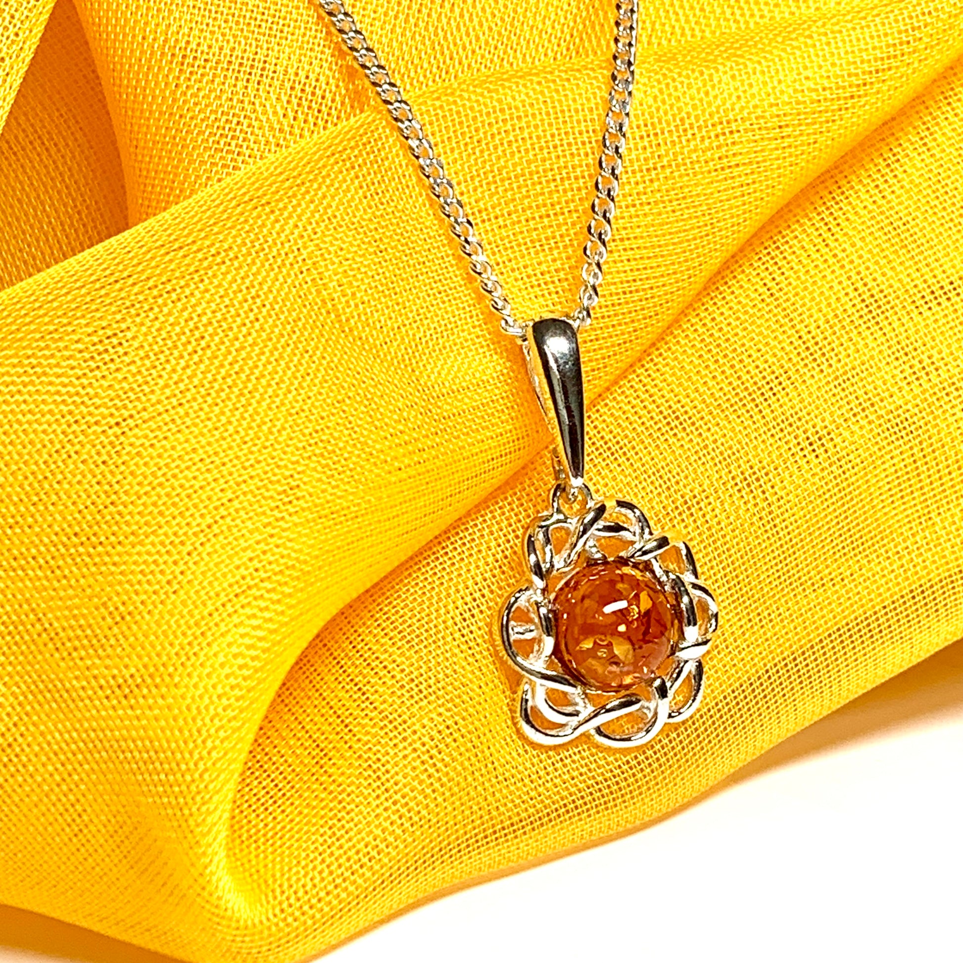 Necklace round sterling silver real amber pendant