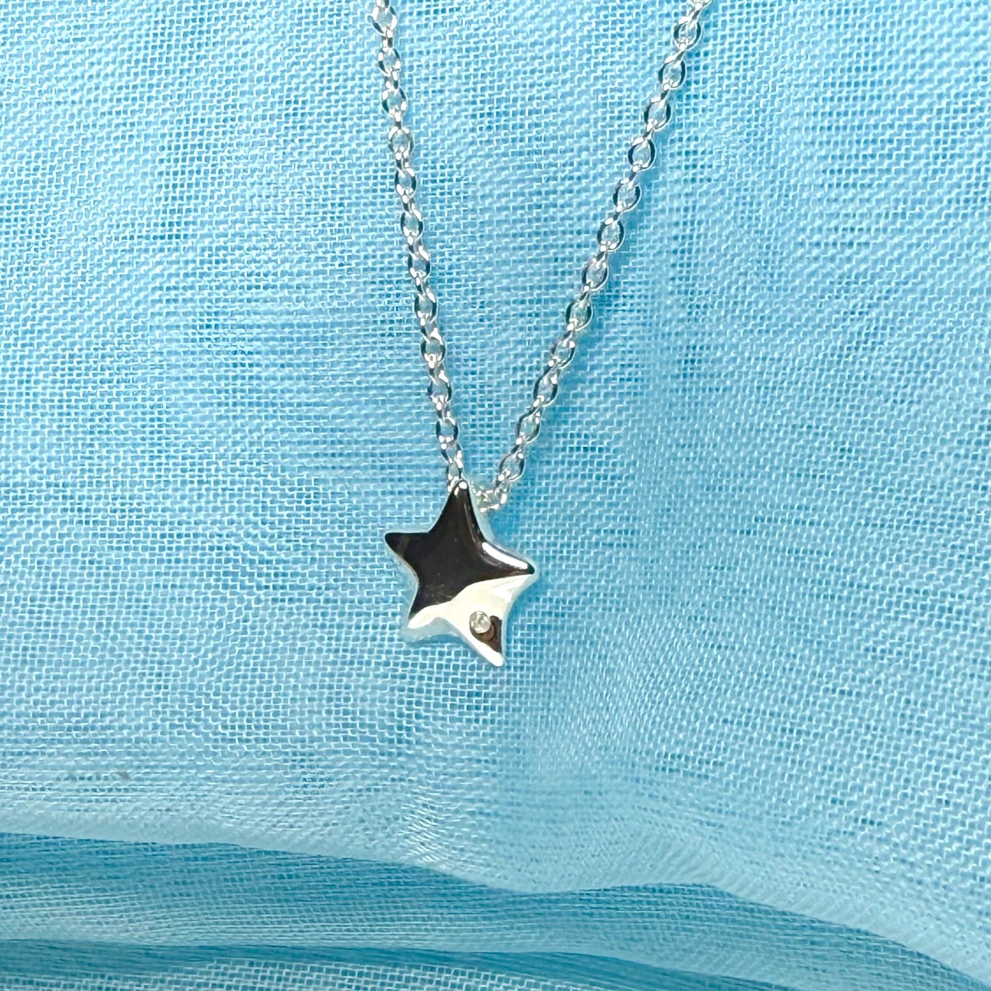 Necklace sterling silver star shaped and cubic zirconia pendant