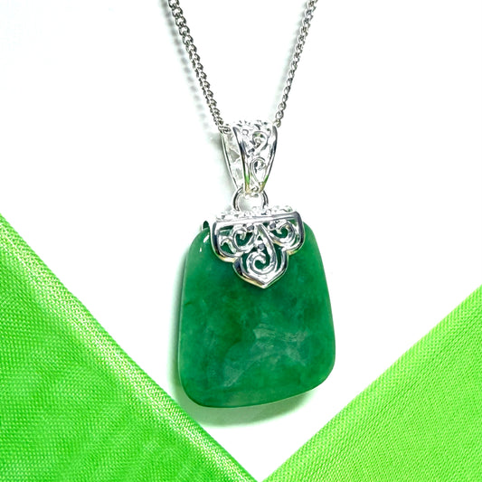 Necklace with a real green jade stone, large cushion shaped pendant with a chain included