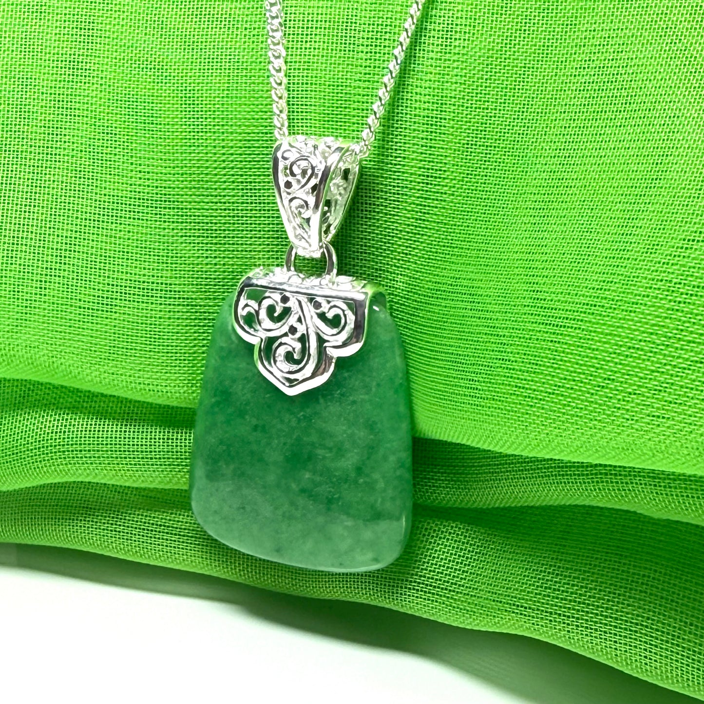 Necklace with a real green jade stone, large necklace cushion shaped, a timeless designed pendant