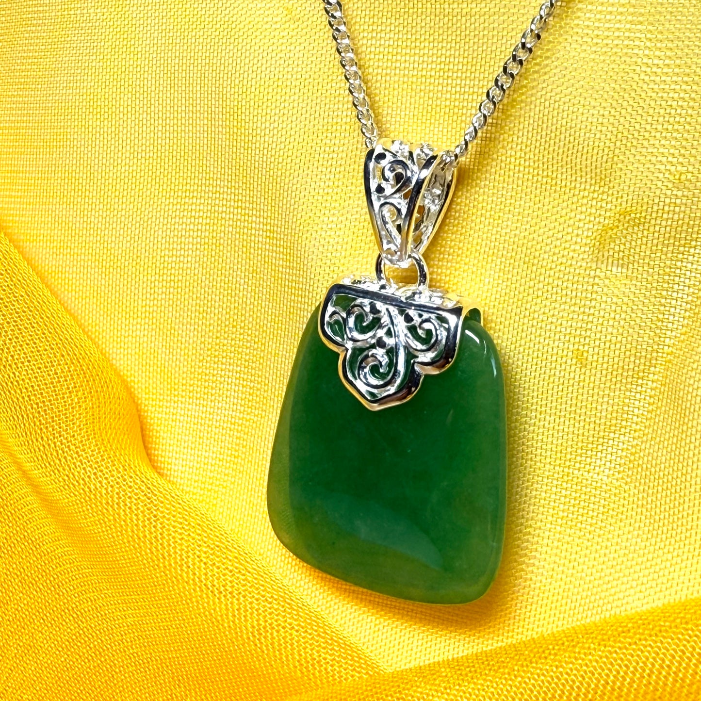 Necklace with a real green jade stone, large necklace cushion shaped, a timeless designed pendant with solid chain
