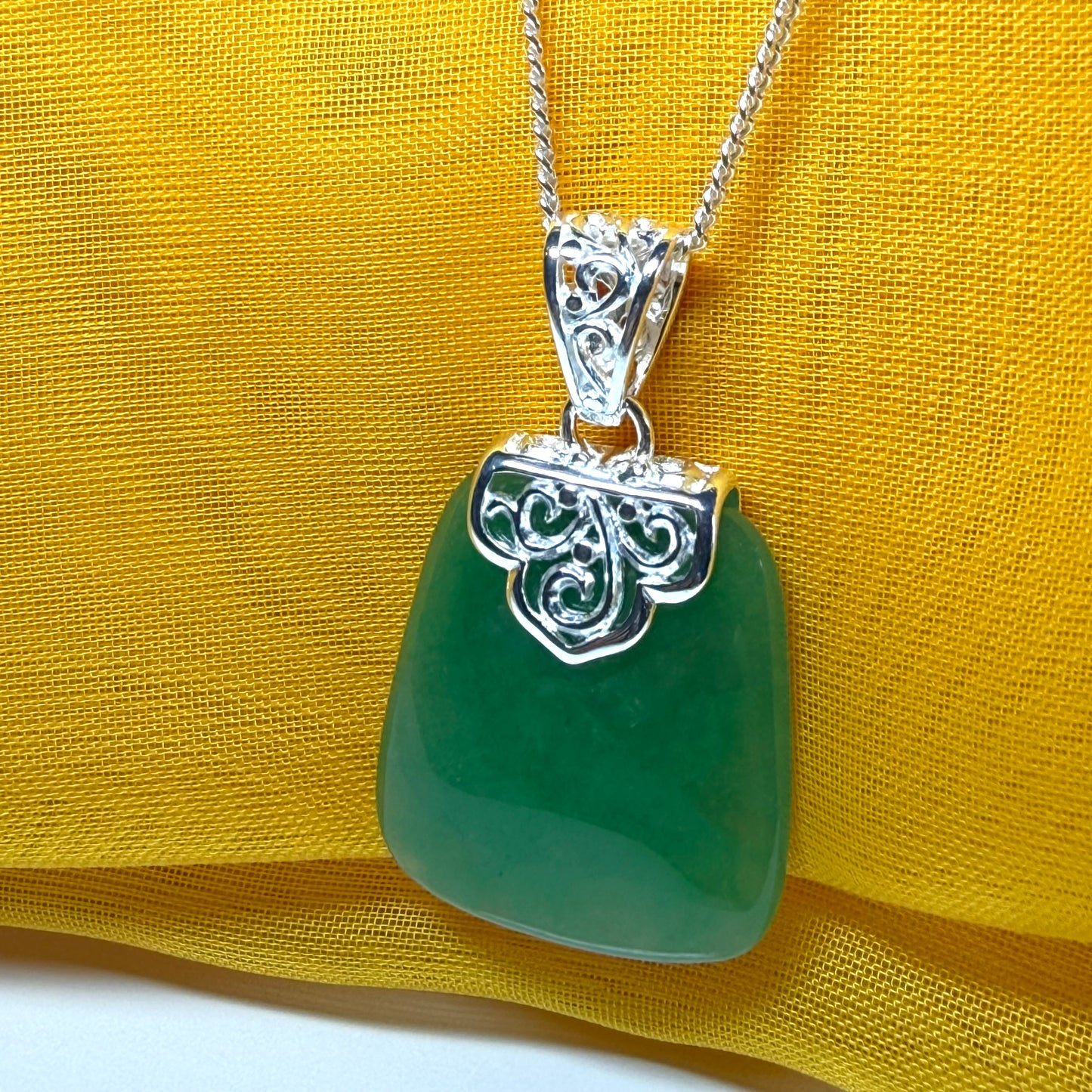 Necklace with a real green jade stone, large necklace cushion shaped, a timeless designed pendant with solid chain