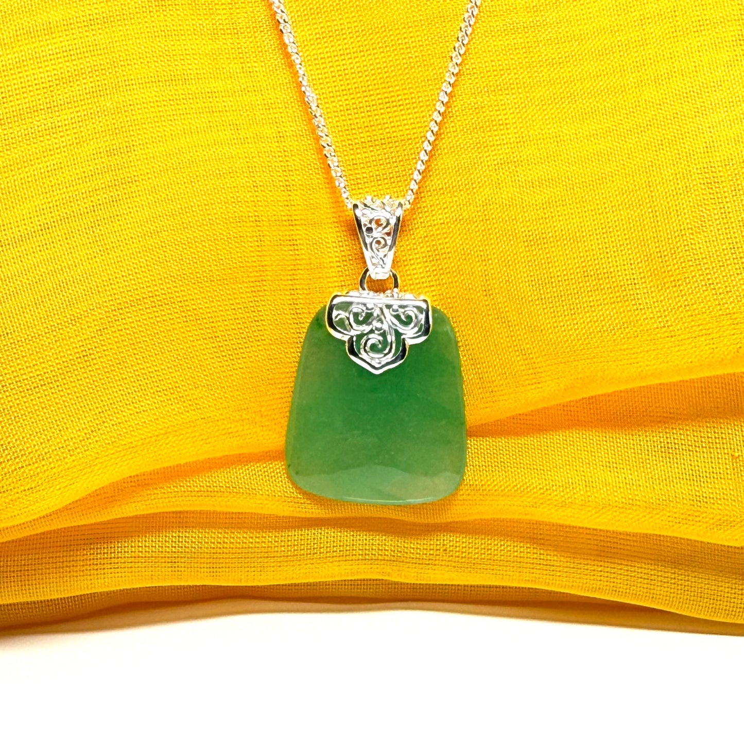 Necklace with a real green jade stone, large necklace cushion shaped, a timeless designed pendant with solid chain included as well
