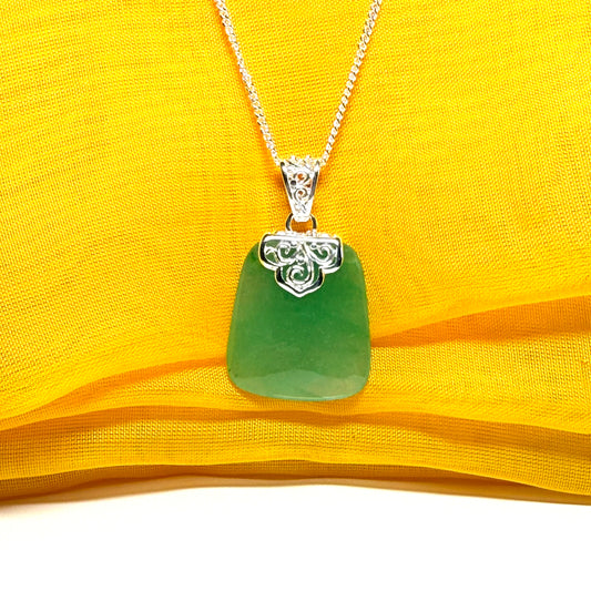 Necklace with a real green jade stone, large necklace cushion shaped, a timeless designed pendant with solid chain included as well