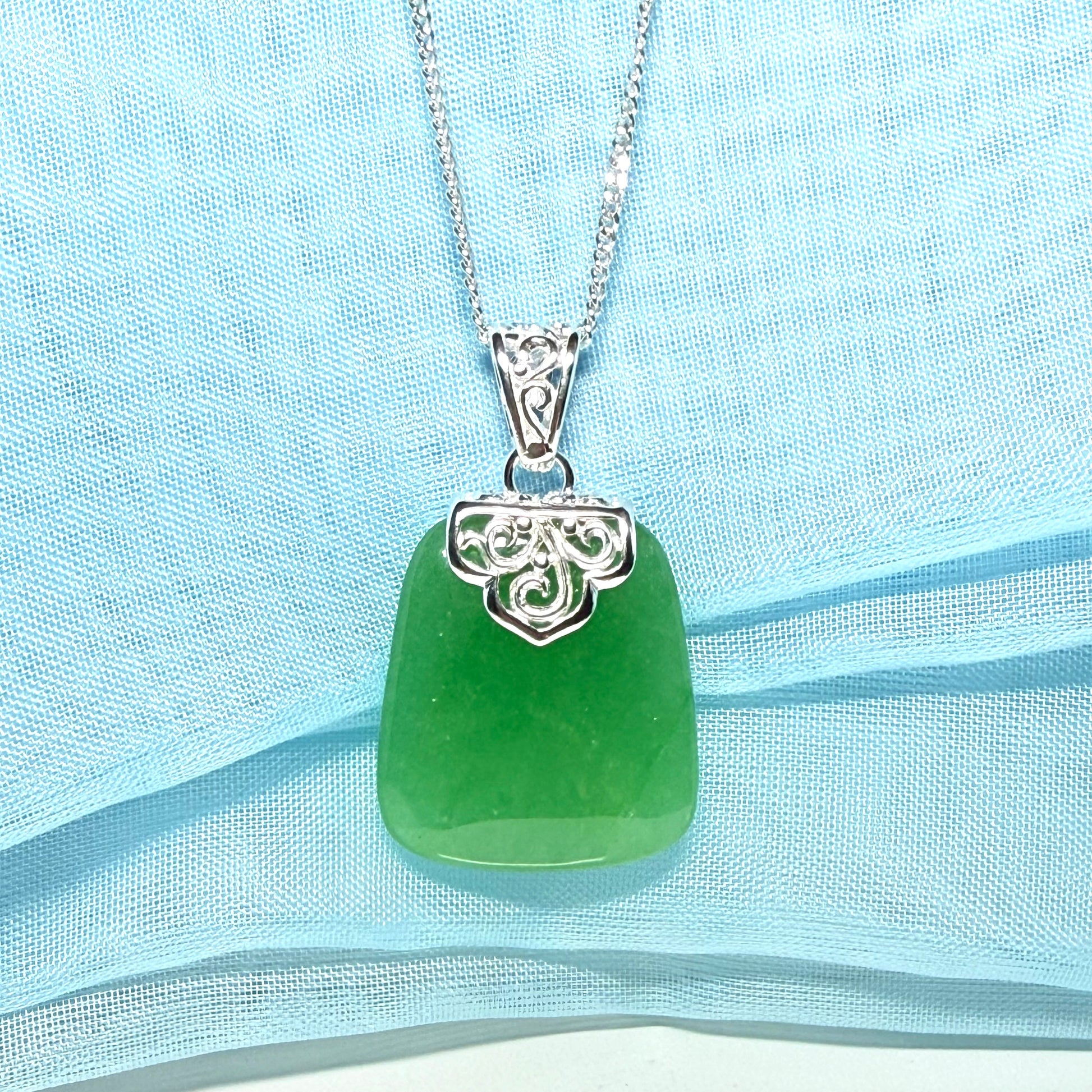 Necklace with a real green jade stone, large necklace cushion shaped, a truly gorgeous designed pendant