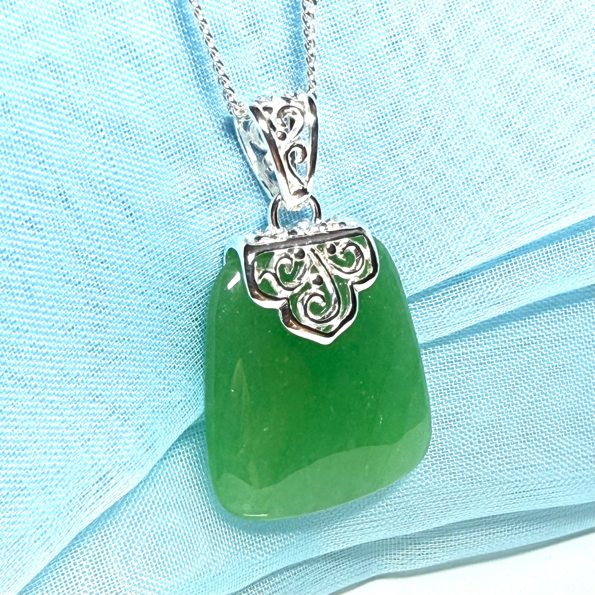 Necklace with a real green jade stone, large necklace cushion shaped, a truly gorgeous designed pendant