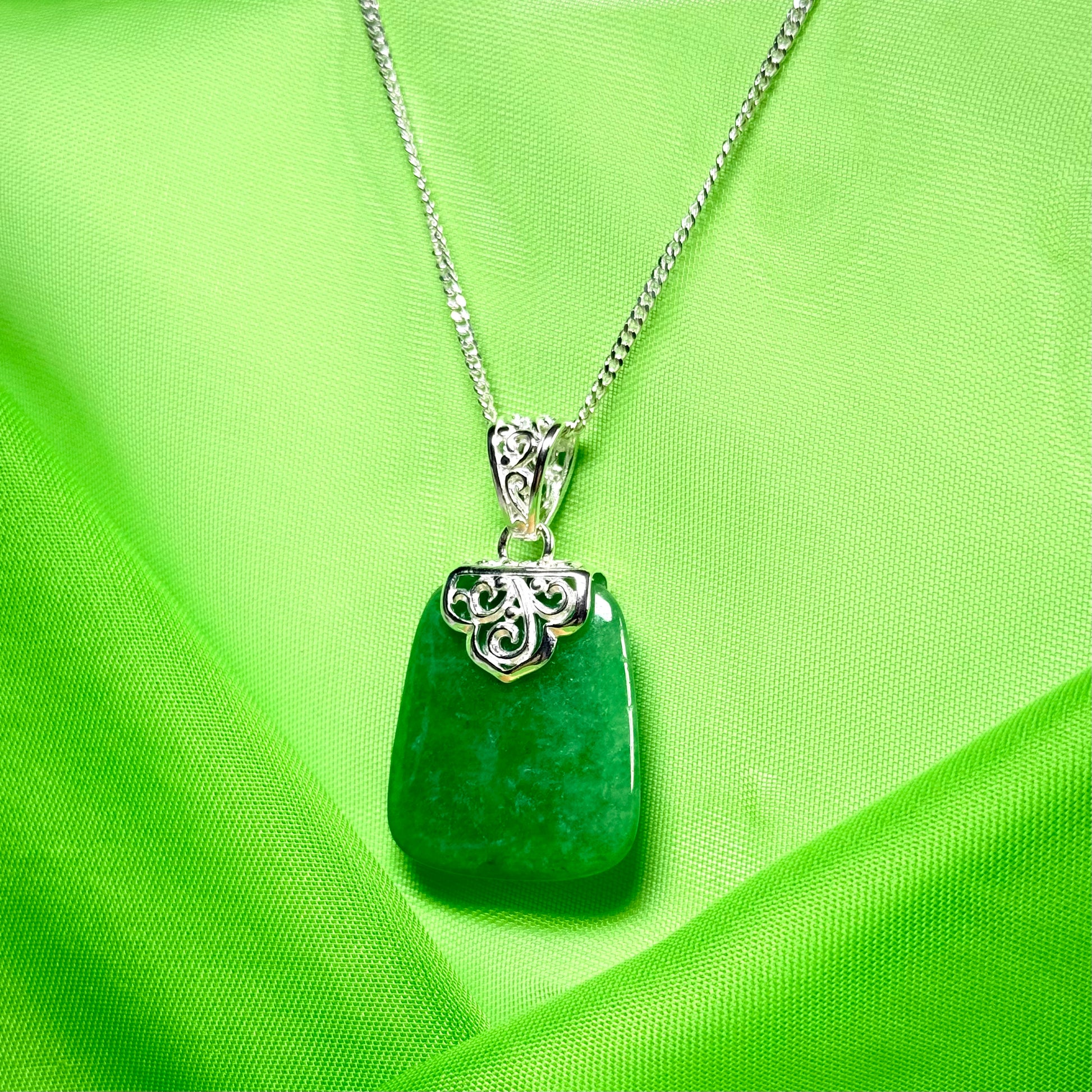 Necklace with a real green jade stone, large necklace cushion shaped, a timeless designed pendant