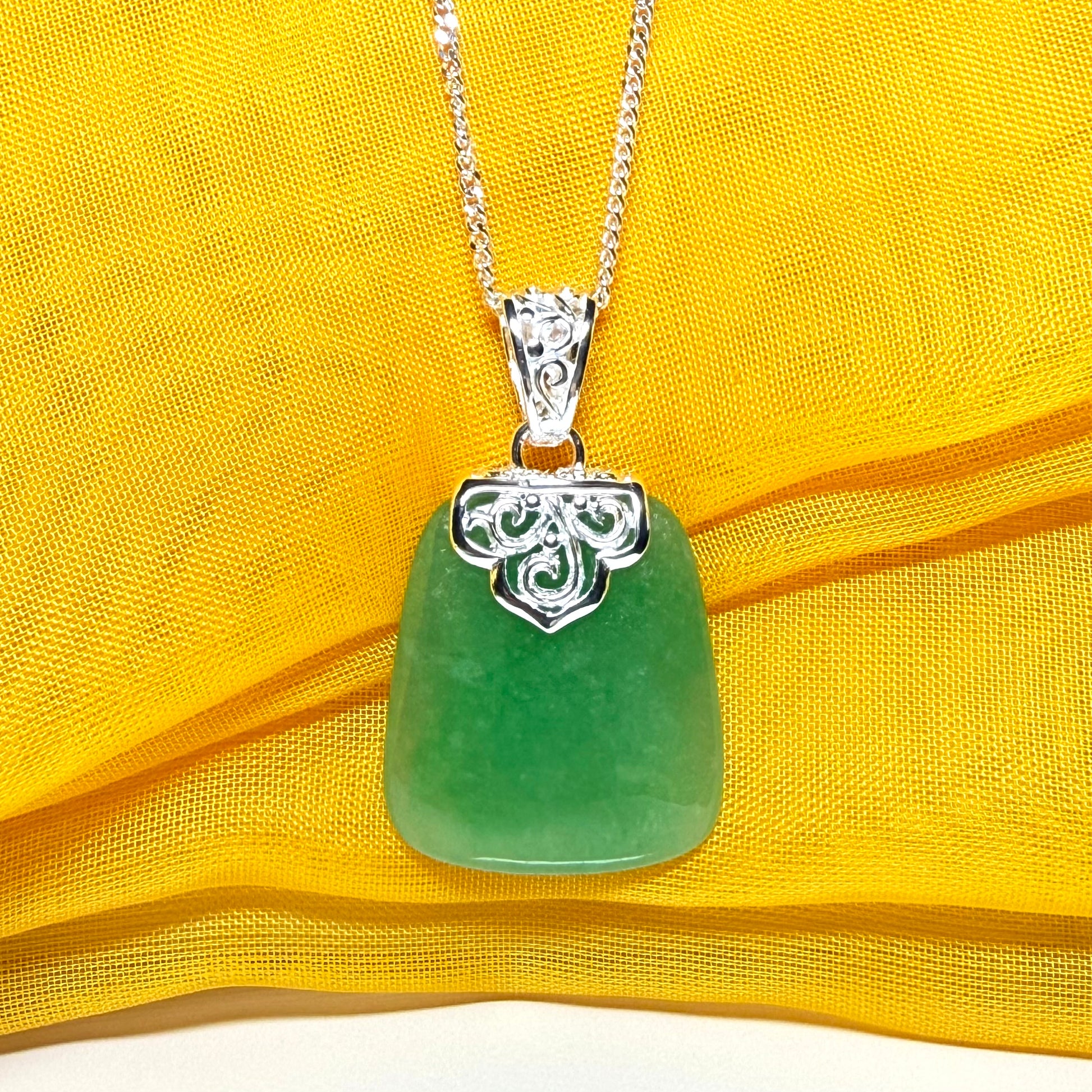 Necklace with a real green jade stone, large pendant cushion shaped with chain
