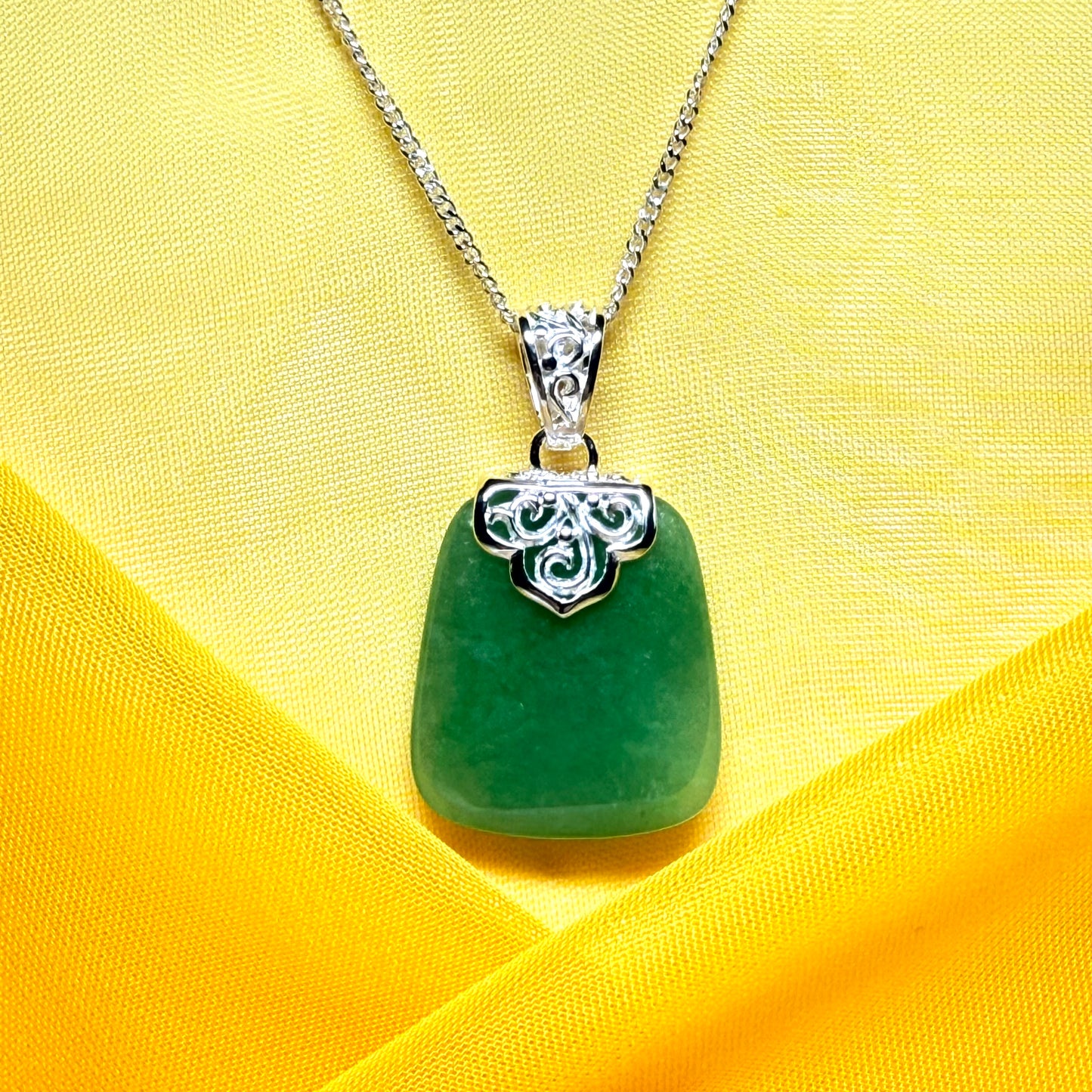 Necklace with a real green jade stone, large pendant cushion shaped with chain