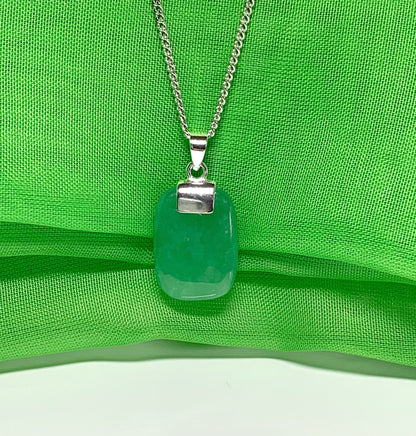 Necklace pendant having a real green jade sterling silver cushion shaped