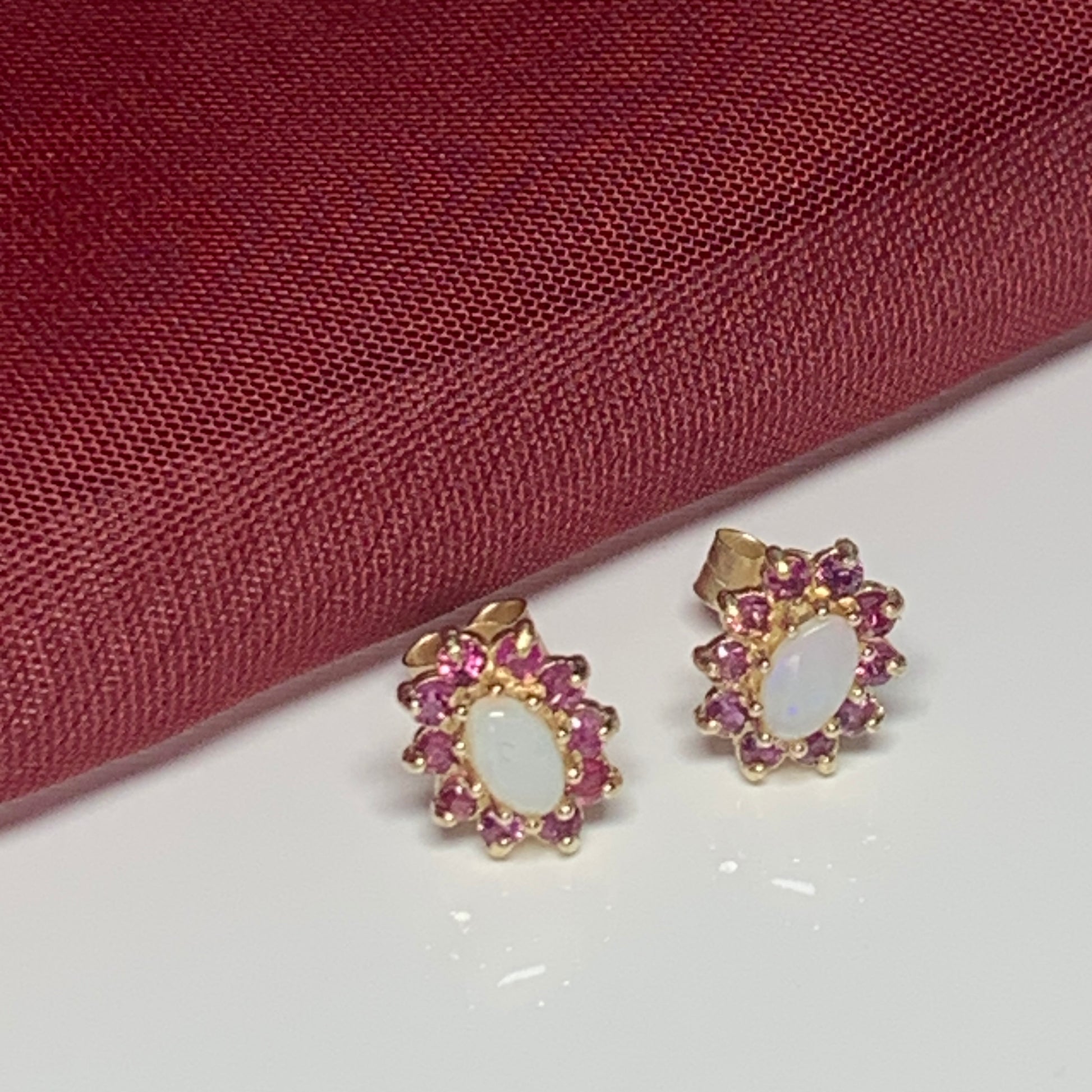 Opal and real ruby oval cluster stud earrings yellow gold