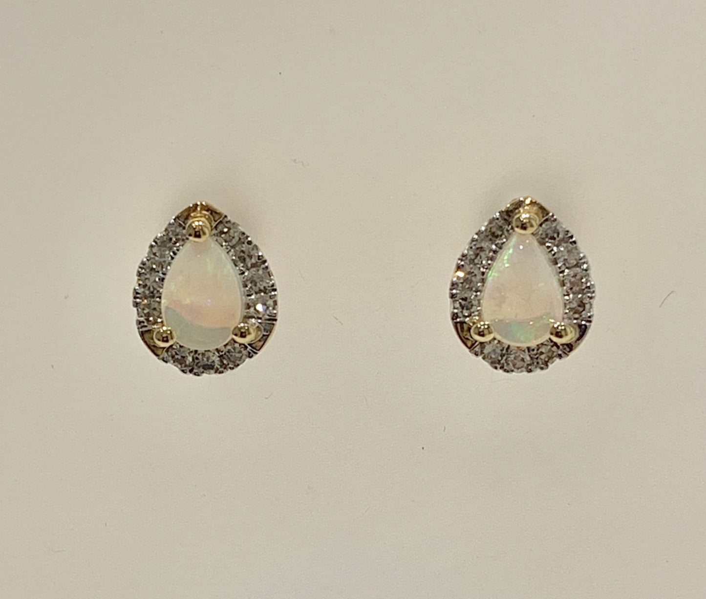 Real opal and diamond pear shaped yellow gold stud cluster earrings
