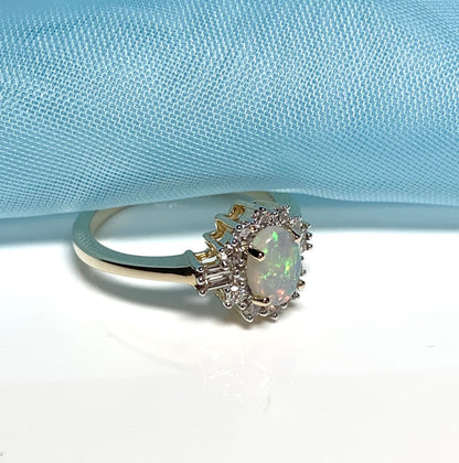 Opal and diamond yellow gold cluster ring with baguette diamonds