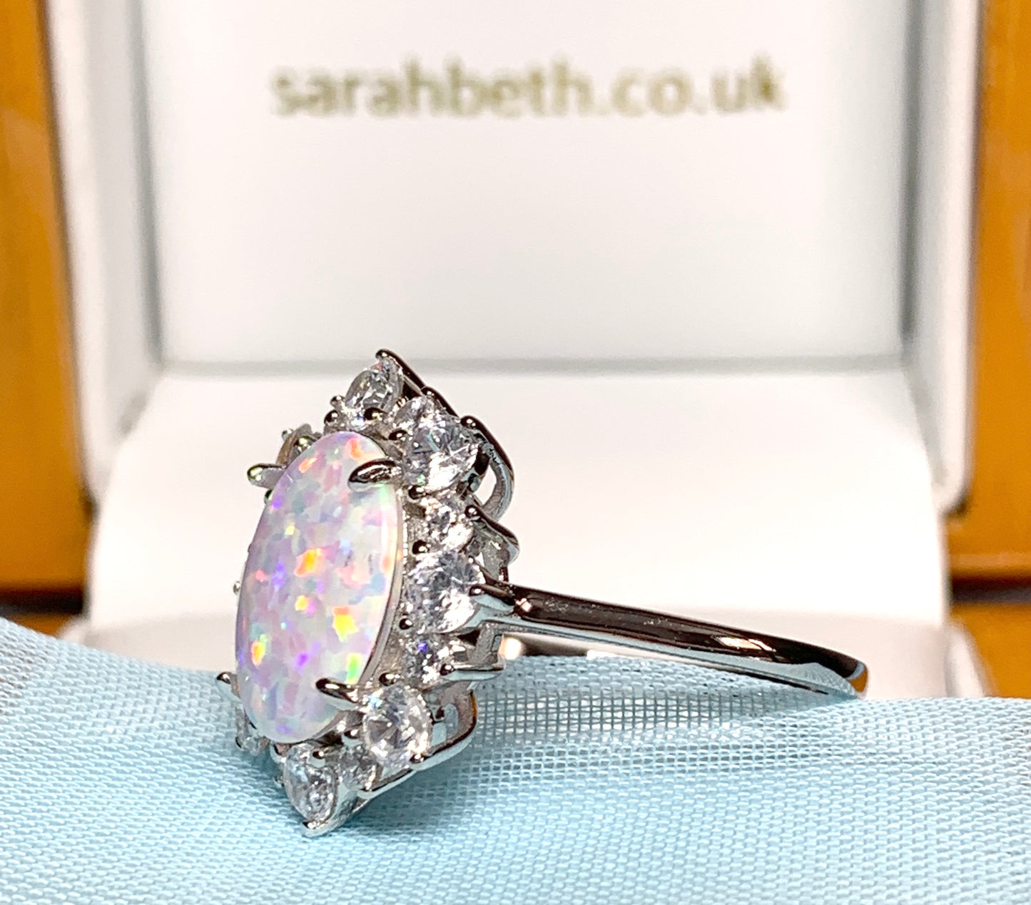 Opal cluster ring oval sterling silver and cubic zirconia