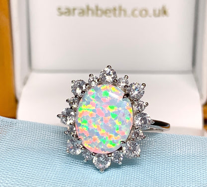 Opal cluster ring oval sterling silver and cubic zirconia