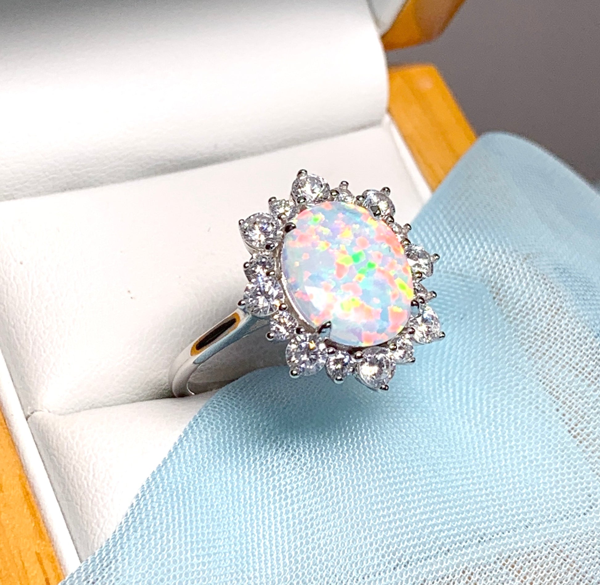 Opal cluster ring oval sterling silver and cubic zirconia