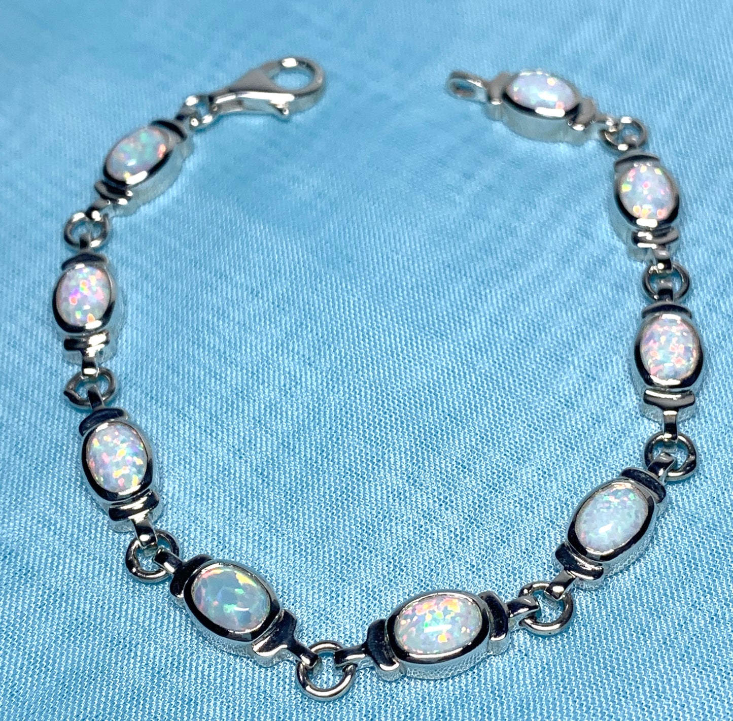 Opal sterling silver fancy oval bracelet