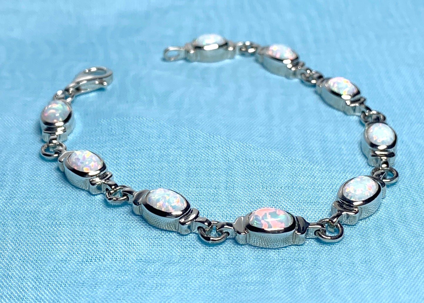 Opal sterling silver fancy oval bracelet