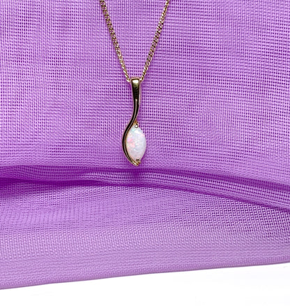 Opal yellow gold oval marquise shaped pendant necklace