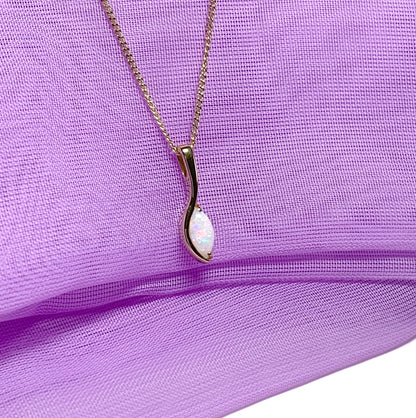 Opal yellow gold oval marquise shaped pendant necklace